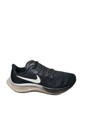 Nike women’s Black Athletic Shoe with White Swoosh size 7.5
